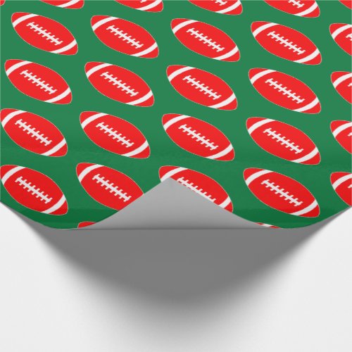 Red Footballs on Green Background Christmas Gift Wrapping Paper